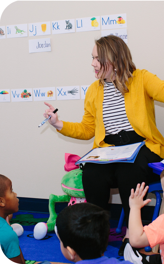 Teacher interacting with children